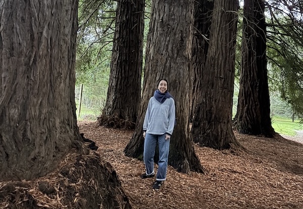 Meg Callander in a wooded forest