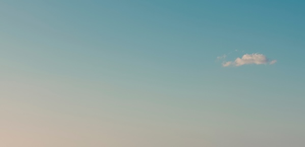 Sky with a tiny cloud top right